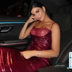 كارولين عزمي تتألق بفستان أحمر في جلسة تصوير جديدة