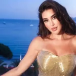 ياسمين صبري تتألق بفستان ذهبي في مهرجان كان السينمائي